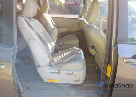 2012 Toyota Sienna Xle 7 Passenger z USA, uszkodzony, nr VIN 5TDDK3DC9CS036692